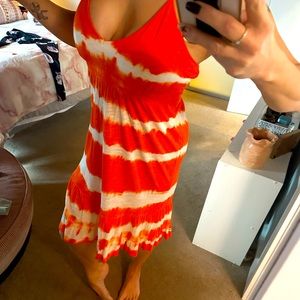 Rip curl, tie-dye, orange, and white dress.